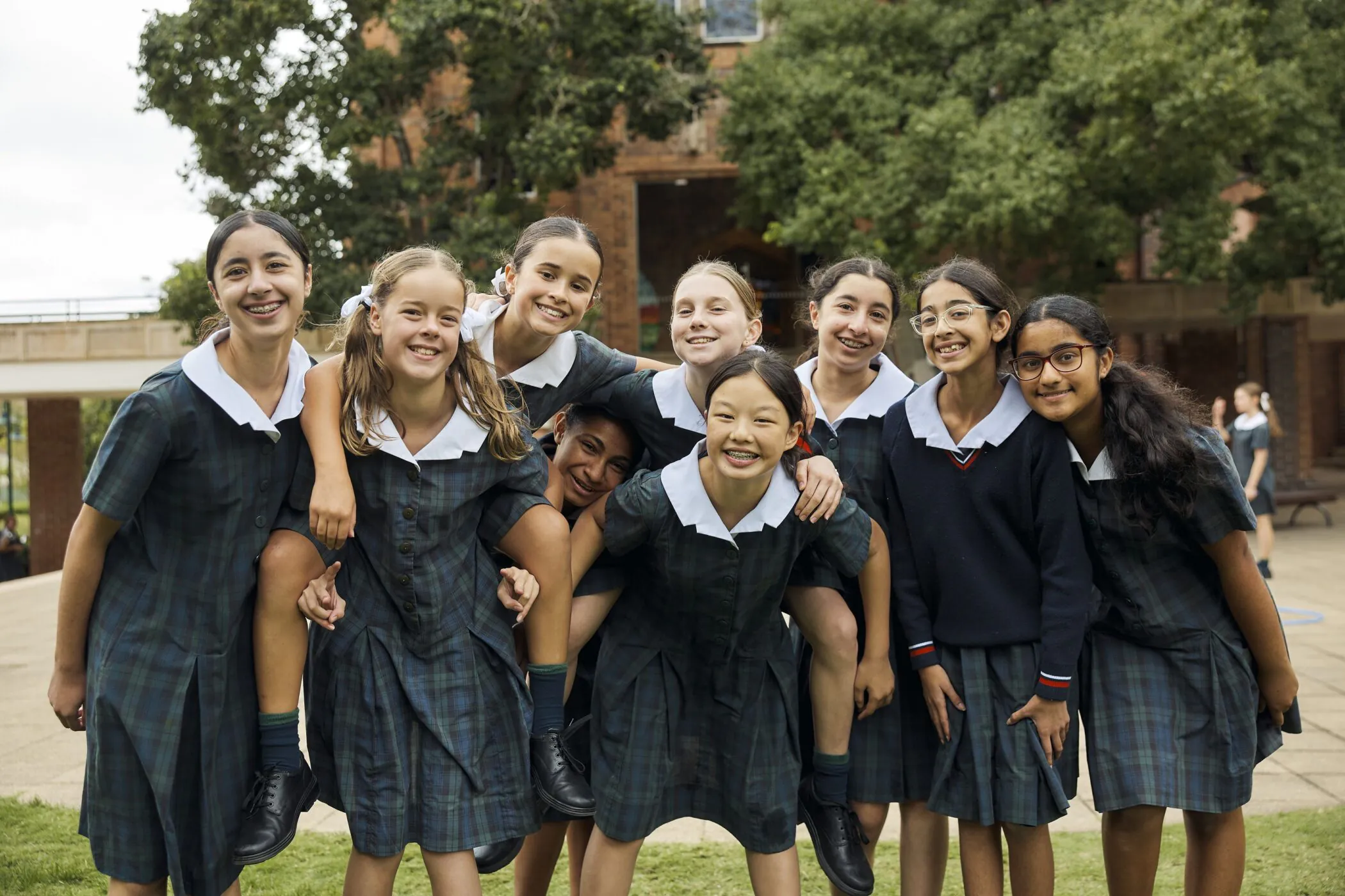Pymble Ladies College Middle School students laughing together outdoors